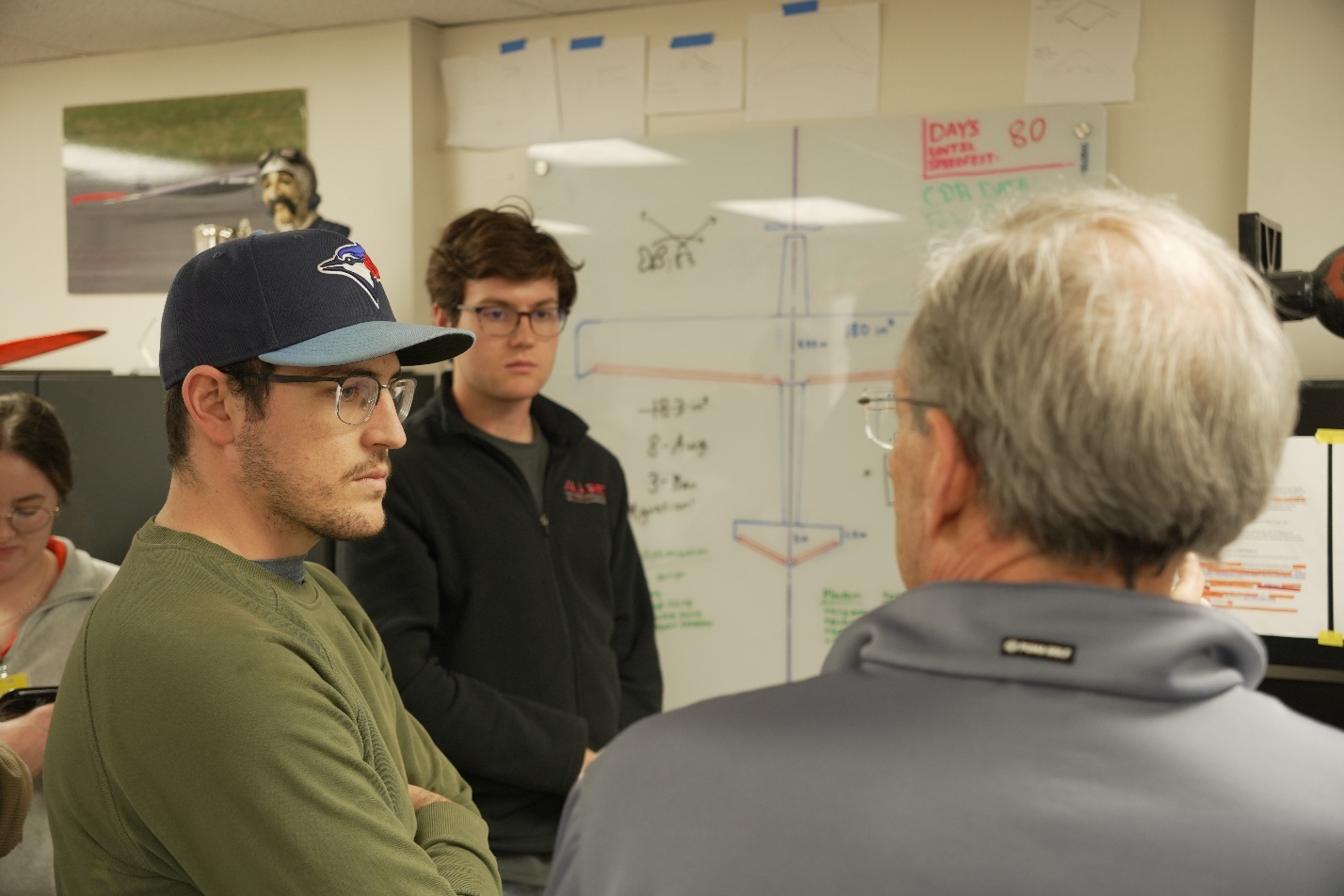 Receiving design feedback from Dr. Arena